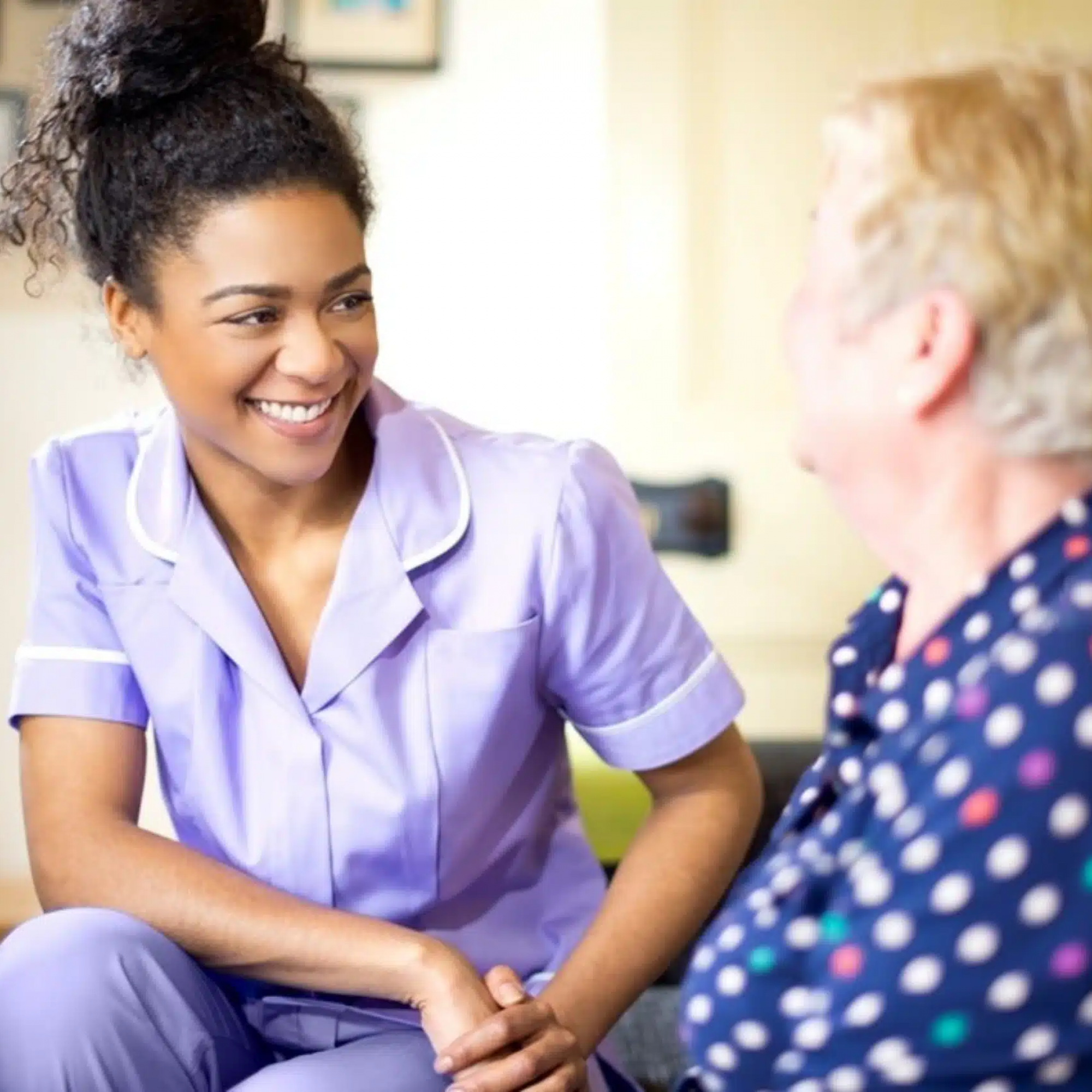 carer-sits-with-blonde-lady-in-spotty-polkadot-blouse_3x2-1.jpg
